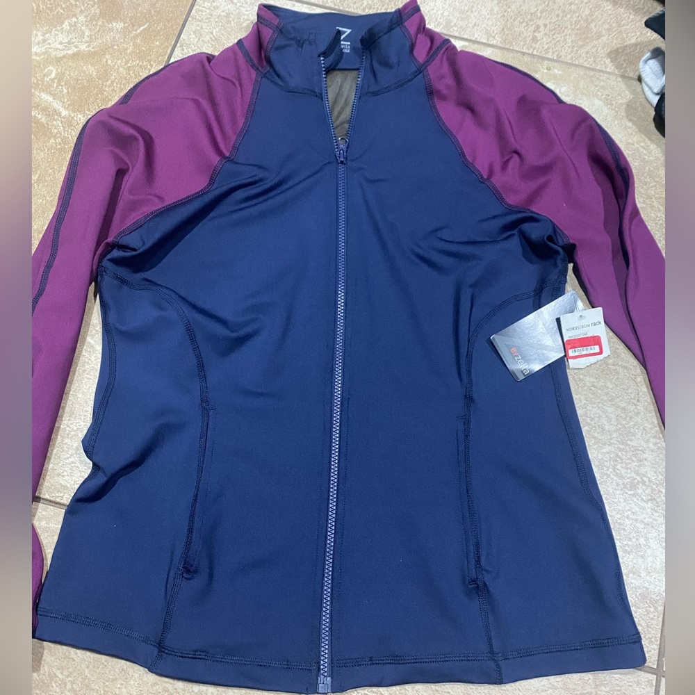 Blue and purple ByZella workout jacket. Size Large.